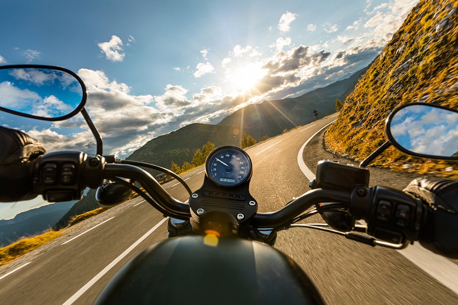 Motorcycle on the road with blue skies
