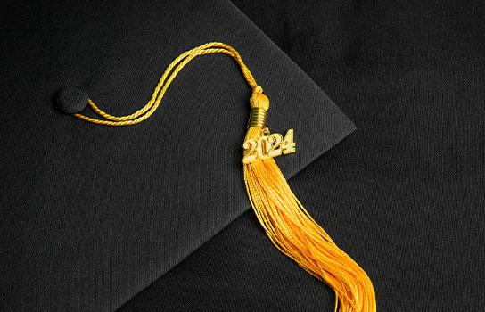 Graduation cap and golden tassel