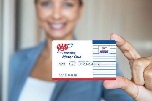 AAA member holding a AAA Hoosier membership card.