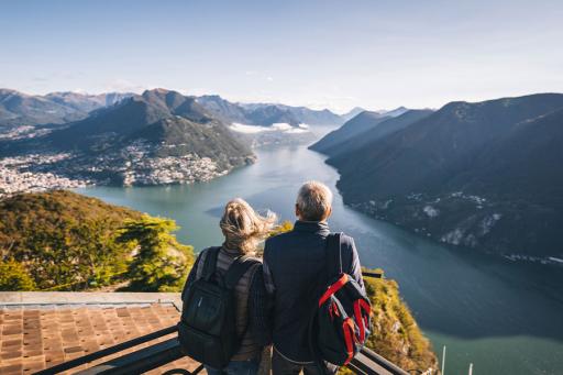 Couple overlooking a majestic view in Switzerland