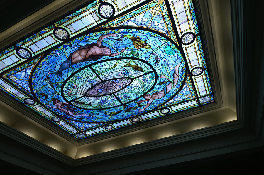 Stainded glass skylight depicting Neptune's daughters